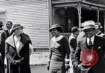 Image of Well dressed African-Americans waiting at a school near a Tennessee Emergency relief camp Tennessee USA, 1936, second 39 stock footage video 65675031562