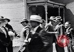 Image of Well dressed African-Americans waiting at a school near a Tennessee Emergency relief camp Tennessee USA, 1936, second 40 stock footage video 65675031562