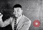 Immagine di Alunni afro-americani in classe drammatica Washington DC USA, 1939, secondo 56 filmato di repertorio 65675031593
