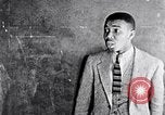 Immagine di Alunni afro-americani in classe drammatica Washington DC USA, 1939, secondo 61 filmato di repertorio 65675031593