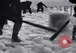 Image of Sailors chop ice from Japanese light cruiser Aleutians, 1942, second 6 stock footage video 65675031675