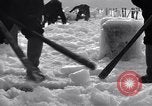 Image of Sailors chop ice from Japanese light cruiser Aleutians, 1942, second 7 stock footage video 65675031675