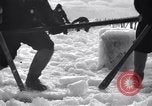 Image of Sailors chop ice from Japanese light cruiser Aleutians, 1942, second 8 stock footage video 65675031675