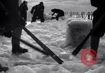 Image of Sailors chop ice from Japanese light cruiser Aleutians, 1942, second 10 stock footage video 65675031675