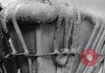 Image of Sailors chop ice from Japanese light cruiser Aleutians, 1942, second 11 stock footage video 65675031675