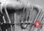 Image of Sailors chop ice from Japanese light cruiser Aleutians, 1942, second 13 stock footage video 65675031675