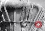 Image of Sailors chop ice from Japanese light cruiser Aleutians, 1942, second 14 stock footage video 65675031675