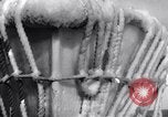 Image of Sailors chop ice from Japanese light cruiser Aleutians, 1942, second 15 stock footage video 65675031675