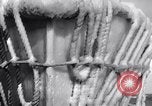 Image of Sailors chop ice from Japanese light cruiser Aleutians, 1942, second 16 stock footage video 65675031675