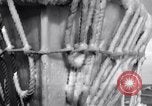 Image of Sailors chop ice from Japanese light cruiser Aleutians, 1942, second 17 stock footage video 65675031675