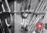 Image of Sailors chop ice from Japanese light cruiser Aleutians, 1942, second 18 stock footage video 65675031675