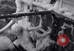 Image of Sailors chop ice from Japanese light cruiser Aleutians, 1942, second 27 stock footage video 65675031675