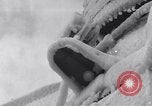 Image of Sailors chop ice from Japanese light cruiser Aleutians, 1942, second 29 stock footage video 65675031675