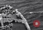 Image of Sailors chop ice from Japanese light cruiser Aleutians, 1942, second 39 stock footage video 65675031675