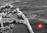 Image of Sailors chop ice from Japanese light cruiser Aleutians, 1942, second 41 stock footage video 65675031675