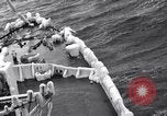 Image of Sailors chop ice from Japanese light cruiser Aleutians, 1942, second 46 stock footage video 65675031675