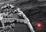 Image of Sailors chop ice from Japanese light cruiser Aleutians, 1942, second 48 stock footage video 65675031675
