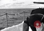 Image of Sailors chop ice from Japanese light cruiser Aleutians, 1942, second 52 stock footage video 65675031675