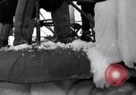 Image of Sailors chop ice from Japanese light cruiser Aleutians, 1942, second 59 stock footage video 65675031675