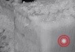 Image of Sailors chop ice from Japanese light cruiser Aleutians, 1942, second 61 stock footage video 65675031675