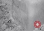 Image of Sailors chop ice from Japanese light cruiser Aleutians, 1942, second 62 stock footage video 65675031675