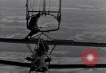 Image N2Y-1 avion d'entraînement des crochets sur et est hissé à bord de l'USS Akron United States USA, 1932, de la seconde 36 séquences d'archives historiques vidéo 65675031703