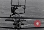 Image N2Y-1 avion d'entraînement des crochets sur et est hissé à bord de l'USS Akron United States USA, 1932, de la seconde 42 séquences d'archives historiques vidéo 65675031703