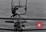 Image N2Y-1 avion d'entraînement des crochets sur et est hissé à bord de l'USS Akron United States USA, 1932, de la seconde 43 séquences d'archives historiques vidéo 65675031703
