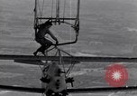 Image N2Y-1 avion d'entraînement des crochets sur et est hissé à bord de l'USS Akron United States USA, 1932, de la seconde 47 séquences d'archives historiques vidéo 65675031703