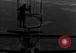 Image N2Y-1 avion d'entraînement des crochets sur et est hissé à bord de l'USS Akron United States USA, 1932, de la seconde 49 séquences d'archives historiques vidéo 65675031703