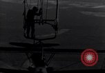 Image N2Y-1 avion d'entraînement des crochets sur et est hissé à bord de l'USS Akron United States USA, 1932, de la seconde 50 séquences d'archives historiques vidéo 65675031703