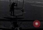 Image N2Y-1 avion d'entraînement des crochets sur et est hissé à bord de l'USS Akron United States USA, 1932, de la seconde 51 séquences d'archives historiques vidéo 65675031703