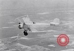 Image of US Navy pilots practice hookups with USS Akron airship New Jersey United States USA, 1932, second 6 stock footage video 65675031710