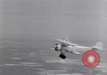 Image of US Navy pilots practice hookups with USS Akron airship New Jersey United States USA, 1932, second 10 stock footage video 65675031710