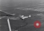 Image of US Navy pilots practice hookups with USS Akron airship New Jersey United States USA, 1932, second 11 stock footage video 65675031710