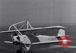 Image of US Navy pilots practice hookups with USS Akron airship New Jersey United States USA, 1932, second 26 stock footage video 65675031710
