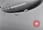 Image of US Navy pilots practice hookups with USS Akron airship New Jersey United States USA, 1932, second 37 stock footage video 65675031710