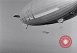 Image of US Navy pilots practice hookups with USS Akron airship New Jersey United States USA, 1932, second 39 stock footage video 65675031710