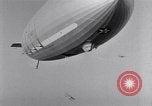 Image of US Navy pilots practice hookups with USS Akron airship New Jersey United States USA, 1932, second 41 stock footage video 65675031710