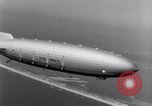 Image of US Navy pilots practice hookups with USS Akron airship New Jersey United States USA, 1932, second 58 stock footage video 65675031710
