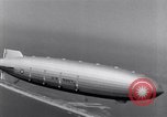 Image of US Navy pilots practice hookups with USS Akron airship New Jersey United States USA, 1932, second 59 stock footage video 65675031710