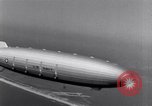 Image of US Navy pilots practice hookups with USS Akron airship New Jersey United States USA, 1932, second 60 stock footage video 65675031710