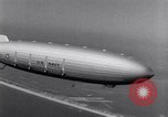 Image of US Navy pilots practice hookups with USS Akron airship New Jersey United States USA, 1932, second 62 stock footage video 65675031710