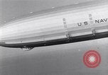 Image USS Akron avec plusieurs Consolidated N2Y-1 les avions en vol New Jersey United States USA, 1932, de la seconde 14 séquences d'archives historiques vidéo 65675031711