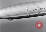 Image USS Akron avec plusieurs Consolidated N2Y-1 les avions en vol New Jersey United States USA, 1932, de la seconde 15 séquences d'archives historiques vidéo 65675031711