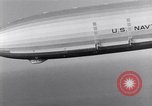 Image USS Akron avec plusieurs Consolidated N2Y-1 les avions en vol New Jersey United States USA, 1932, de la seconde 16 séquences d'archives historiques vidéo 65675031711