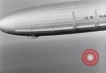 Image USS Akron avec plusieurs Consolidated N2Y-1 les avions en vol New Jersey United States USA, 1932, de la seconde 17 séquences d'archives historiques vidéo 65675031711