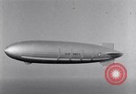 Image USS Akron avec plusieurs Consolidated N2Y-1 les avions en vol New Jersey United States USA, 1932, de la seconde 27 séquences d'archives historiques vidéo 65675031711