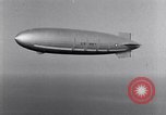 Image USS Akron avec plusieurs Consolidated N2Y-1 les avions en vol New Jersey United States USA, 1932, de la seconde 29 séquences d'archives historiques vidéo 65675031711