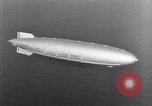 Image USS Akron avec plusieurs Consolidated N2Y-1 les avions en vol New Jersey United States USA, 1932, de la seconde 33 séquences d'archives historiques vidéo 65675031711